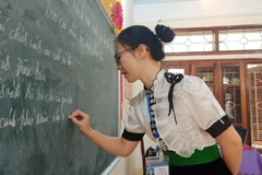 Giờ dạy của giáo viên Trường Trung học cơ sở Pom Lót, tỉnh Điện Biên. (Ảnh: Phạm Mai/Vietnam+)