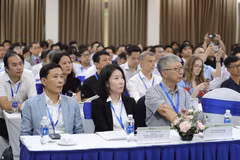 Các chuyên gia trong nước và quốc tế tham gia hội thảo. (Ảnh: PV/Vietnam+)