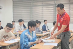 Thí sinh dự thi môn Ngữ văn. (Ảnh: Hoài Nam/Vietnam+)