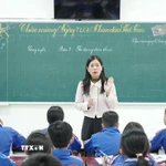 Cô Chu Thị Thu, giáo viên môn Tin học-Công nghệ dạy hợp đồng tại trường Tiểu học Đồng Phú đã 10 năm nay. (Ảnh: Thanh Thủy/TTXVN)