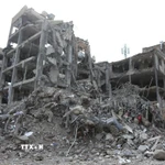 Những tòa nhà bị phá hủy sau các cuộc tấn công tại Tehran, Iran, ngày 12/3/2026. (Ảnh: THX/TTXVN)