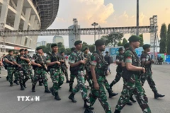 Lực lượng an ninh được triển khai để đảm bảo an toàn cho trận U23 Việt Nam-U23 Indonesia. (Ảnh: Đỗ Quyên/TTXVN)