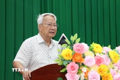Ông Bùi Quang Huy, nguyên Ủy viên Trung ương Đảng, nguyên Bí thư Tỉnh ủy Trà Vinh đóng góp ý kiến đối với dự thảo văn kiện. (Ảnh: Thanh Hòa/TTXVN)