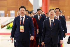 Các đại biểu đến dự ngày làm việc thứ tư Đại hội XIV của Đảng, sáng 22/1. (Ảnh: TTXVN)