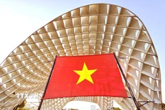 Điểm du lịch Công viên APEC ở thành phố Đà Nẵng được trang trí cờ Tổ quốc với kích thước lớn để chào mừng Đại hội đại biểu toàn quốc lần thứ XIV của Đảng. (Ảnh: Trần Lê Lâm/TTXVN)