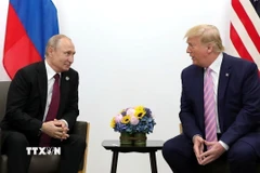 Tổng thống Mỹ Donald Trump (phải) trong cuộc gặp Tổng thống Nga Vladimir Putin tại Helsinki (Phần Lan) ngày 16/7/2018. (Ảnh: THX/TTXVN)