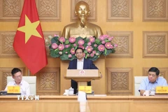 Thủ tướng Phạm Minh Chính làm việc với Hội đồng Tư vấn chính sách. (Ảnh: Dương Giang/TTXVN)