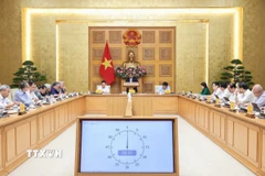 Thủ tướng Phạm Minh Chính làm việc với Hội đồng Tư vấn chính sách. (Ảnh: Dương Giang/TTXVN)