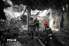 Sau nỗ lực chữa cháy, đám cháy đã được dập tắt hoàn toàn. (Ảnh: Hoàng Hùng/TTXVN)