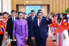 Thủ tướng Phạm Minh Chính và Thủ tướng Thái Lan Paetongtarn Shinawatra. (Ảnh: Dương Giang/TTXVN)