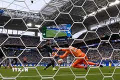 Abdulelah Al-Amri ghi bàn cho Saudi Arabia. (Ảnh: AFP/TTXVN)