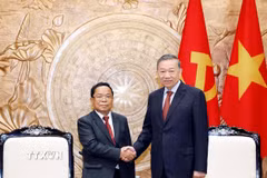 Tổng Bí thư, Chủ tịch nước Tô Lâm tiếp Ủy viên Bộ Chính trị, Phó Thủ tướng, Bộ trưởng Bộ Tư pháp Lào Khamphan Phommathat. (Ảnh: Thống Nhất/TTXVN)