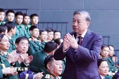 Tổng Bí thư Tô Lâm, Bí thư Quân ủy Trung ương, các đồng chí lãnh đạo và các đại biểu tham dự lễ tổng kết. (Ảnh: Thống Nhất/TTXVN)