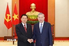 Tổng Bí thư Tô Lâm tiếp đồng chí Thượng tướng Vanthong Kongmany, Bí thư Trung ương Đảng, Bộ trưởng Bộ Công an Lào. (Ảnh: Thống Nhất/TTXVN)
