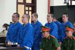 Các bị cáo Phạm Lý Phương, Đào Xuân Lộc, Nguyễn Anh Duy và Nguyễn Tuấn Anh tại phiên tòa sơ thẩm, bị xét xử về tội cướp tài sản. (Ảnh: Minh Phú/TTXVN)