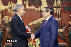 Thủ tướng Phạm Minh Chính tiếp ông Adam Mulawarman Tugio, Đại sứ Đặc mệnh toàn quyền Cộng hòa Indonesia tại Việt Nam. (Ảnh: Dương Giang/TTXVN)