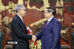 Thủ tướng Phạm Minh Chính tiếp ông Adam Mulawarman Tugio, Đại sứ Đặc mệnh toàn quyền Cộng hòa Indonesia tại Việt Nam. (Ảnh: Dương Giang/TTXVN)