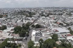 Sau sáp nhập, xã Bà Điểm có diện tích tự nhiên 27,36km2 và quy mô dân số đặc biệt lớn, lên tới hơn 206.000 người. (Ảnh: Hữu Duyên/TTXVN)