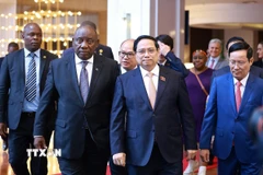 Thủ tướng Phạm Minh Chính và Tổng thống Nam Phi Matamela Cyril Ramaphosa dự Diễn đàn doanh nghiệp Việt Nam-Nam Phi. (Ảnh: Dương Giang/TTXVN)