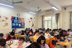 Học sinh Trường Tiểu học Nghĩa Tân (phường Nghĩa Đô, Hà Nội). (Ảnh: Nguyễn Cúc/TTXVN)