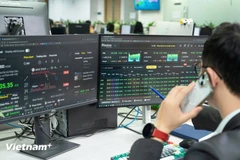 VN-Index đóng cửa phiên 12/11 tăng 38,25 điểm lên 1.631,86 điểm. (Ảnh: Vietnam+)