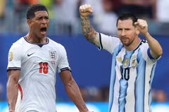 Jude Bellingham đối đầu Lionel Messi. (Ảnh: AFP/TTXVN)