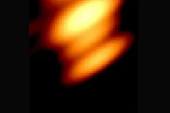 Lần đầu tiên phát hiện hình ảnh hai hố đen siêu khối lượng quay quanh nhau. (Nguồn: space)