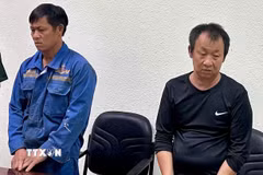 Các đối tượng tại Cơ quan Công an. (Ảnh: TTXVN phát)