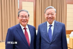 Tổng Bí thư Tô Lâm gặp Thủ tướng Trung Quốc Lý Cường. (Ảnh: TTXVN)