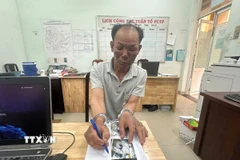 Nghi can phóng hỏa làm 3 người tử vong tại thành phố Thủ Đức. (Ảnh: TTXVN phát)