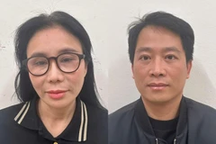 Phan Thị Mai và chồng Hoàng Kim Khánh tại cơ quan điều tra. (Nguồn: Bộ Công an)