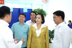 Phó Chủ tịch Quốc hội Nguyễn Thị Thanh đã đến kiểm tra, giám sát công tác tổ chức bầu cử tại xã Tân Nhựt, Thành phố Hồ Chí Minh. (Ảnh: Hữu Duyên/TTXVN)