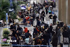 Hành khách tại sân bay quốc tế Incheon, Hàn Quốc. (Ảnh: Yonhap/TTXVN phát)