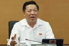 Ông Trần Hồng Minh, Ủy viên Trung ương Đảng, Bộ trưởng Bộ Xây dựng. (Ảnh: Phương Hoa/TTXVN)