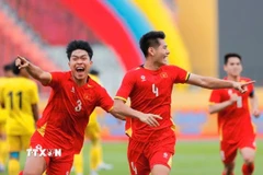 Niềm vui của các cầu thủ U22 Việt Nam. (Ảnh: Minh Quyết/TTXVN)