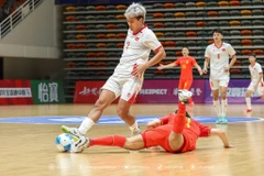 Tuyển Futsal Việt Nam (áo trắng) toàn thắng tại vòng loại Futsal châu Á 2026. (Nguồn: VFF)