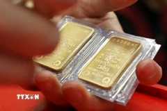 Siết chặt giám sát hoạt động kinh doanh vàng tại Thành phố Hồ Chí Minh và Đồng Nai. (Ảnh: Minh Quyết/TTXVN)