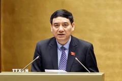 Ủy viên Ủy ban Thường vụ Quốc hội Nguyễn Đắc Vinh trình bày Báo cáo giải trình, tiếp thu, chỉnh lý dự thảo Luật sửa đổi, bổ sung một số điều của Luật Quảng cáo. (Ảnh: Doãn Tấn/TTXVN)