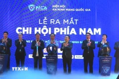 Nghi thức ra mắt Chi hội phía Nam của Hiệp hội An ninh mạng quốc gia. (Ảnh: Hứa Chung/TTXVN)