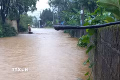 Mưa lớn tại xã Bản Giang, huyện Tam Đường, có 70 ngôi nhà bị ngập. (Ảnh: TTXVN phát)