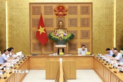 Thủ tướng Phạm Minh Chính chủ trì Phiên họp lần thứ 15 của Ban Chỉ đạo Quốc gia về chống khai thác hải sản bất hợp pháp. (Ảnh: Dương Giang/TTXVN)