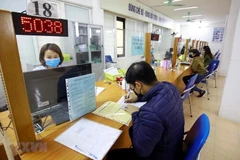 Thủ tướng yêu cầu kịp thời bố trí kinh phí chi trả chế độ cho cán bộ, công chức khi sắp xếp bộ máy. (Ảnh: PV/Vietnam+)