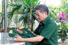Cựu chiến binh Lương Khuyến Giang ở Tổ dân phố 6, thị trấn Yên Bình, huyện Yên Bình (Yên Bái) tự hào khi góp một phần vào Đại thắng mùa Xuân năm 1975. (Ảnh: Tuấn Anh/TTXVN)