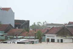 Đắk Lắk nhiều khu vực vẫn ngập sâu trong nước lũ. (Ảnh: Tuấn Anh/TTXVN)