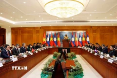 Tổng Bí thư Tô Lâm hội kiến Chủ tịch Quốc hội Lào Saysomphone Phomvihane. (Ảnh: Thống Nhất/TTXVN)