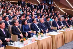 Thủ tướng Phạm Minh Chính và các đại biểu tham dự Đại hội thi đua yêu nước ngành Ngân hàng lần thứ 9. (Ảnh: Phạm Kiên/TTXVN)