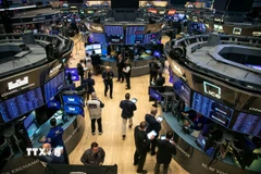 Hoạt động tại Sàn giao dịch chứng khoán New York, Mỹ. (Ảnh: THX/TTXVN)