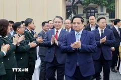 Thủ tướng Phạm Minh Chính đến dự Hội nghị toàn quốc tổng kết công tác Tư pháp năm 2025. (Ảnh: Dương Giang/TTXVN)