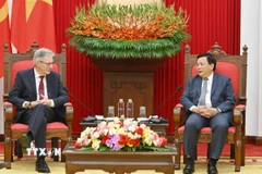 Ông Nguyễn Xuân Thắng tiếp đoàn Đảng Dân chủ xã hội Đức (SPD). (Ảnh: Phương Hoa/TTXVN)