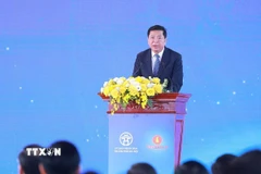 Bộ trưởng Bộ Xây dựng Trần Hồng Minh phát biểu. (Ảnh: Dương Giang/TTXVN)